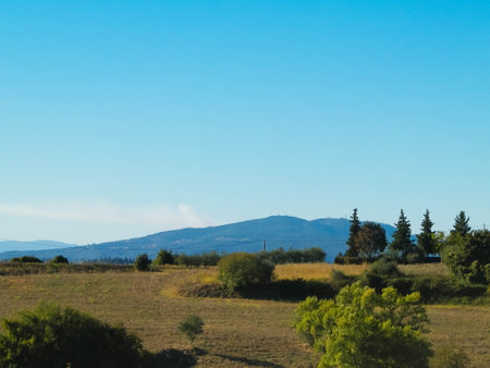 Hills of Tuscany, Chianti Region, Italy. Sunny day and typical Tuscan village landscape. Travel and agriculture concept.の写真素材