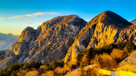 Lovcen mountain peaks on a sunny day. The Lovcen Mountains lie around Boka Kotorska in Montenegro. Montenegro is a popular tourist destination in the Balkans.の写真素材