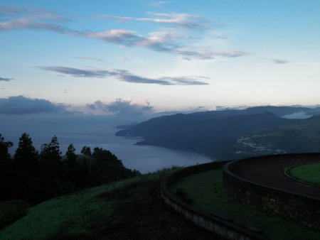 Stunning sunset over coast in Sao Miguel island. Sao Miguel is the biggest island of Azores Archipelago.の写真素材