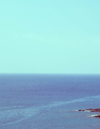 Seascape of Lanzarote island cliffs. Rocky coast, nature concept.の写真素材