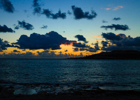 Stunning sunset or sunrise sky over Mediterranean sea. Beautiful nature of Malta Marfa Peninsula.の写真素材