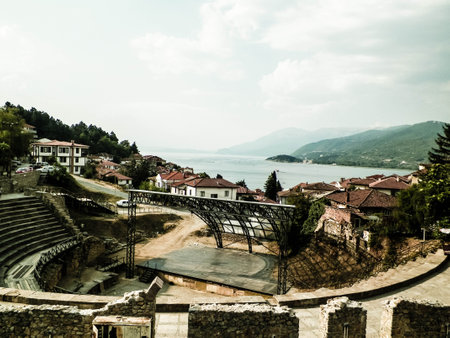 Old town in Ochrid City, amphitheater and water of Ochrid Lake as background. Architecture and tourism concept. Ohrid is one of only 28 sites that are part of UNESCO's World Heritage that are Cultural as well as Natural sites.の写真素材