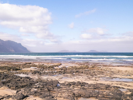 The Atlantic shore in Caleta de Famara. Lanzarote Island. Canarians.の写真素材