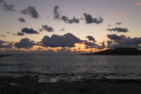 Stunning sunset or sunrise sky over Mediterranean sea. Beautiful nature of Malta Marfa Peninsula.の写真素材