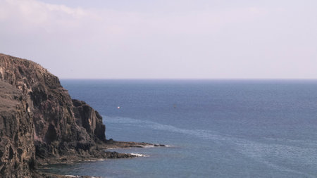 Rocks on the coast of Lanzarote Island. Beauty of nature. Travel concept.の写真素材
