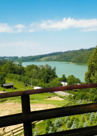 Rural landscape of Wiezyca region in Poland. Pastures, meadows and lake in background.の写真素材