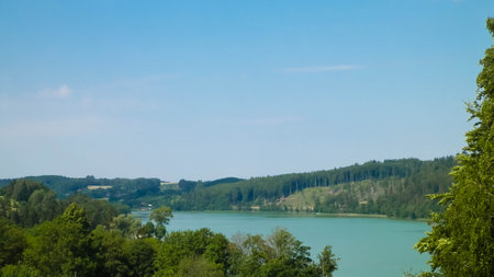 Rural landscape of Wiezyca region in Kashubia, Poland. Pastures, meadows and lake in background.の写真素材