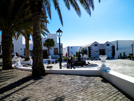 Street view of main promenade in Yaiza, Lanzarote is. Tropical climate and Canarian architecture.の写真素材