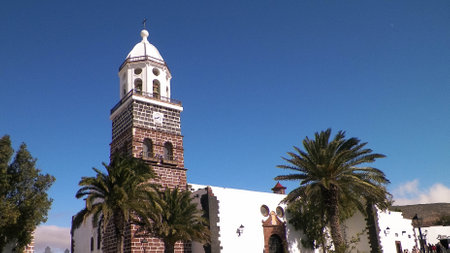 Outdoor view of church in Yaiza City, Lanzarote. Religion, architecture and travel concept.の写真素材