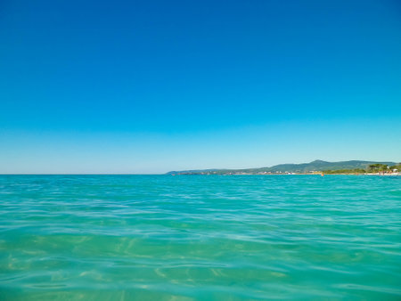 Blue, banner Tyrrhenian sea water on blue sky background. Vacations and nature concept. Copy space.の写真素材