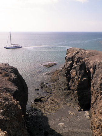 Boat on coast of Lanzarote Island. Travel Concept.の写真素材