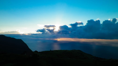Stunning sunset over coast in Sao Miguel island. Sao Miguel is the biggest island of Azores Archipelago.の写真素材
