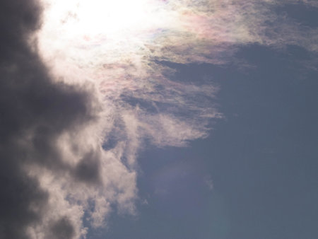 Sun hiding behind the clouds. Weather concept.の写真素材