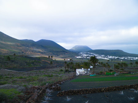 City of Haria and it's surrounding nature. Haria is city in north of Lanzarote island and is named as "City of thousand palms". Nature and travel concept.の写真素材