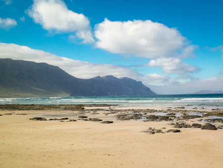 Caleta de Famara beach on the island of Lanzarote. Canaries. An iconic place among surfers.の写真素材