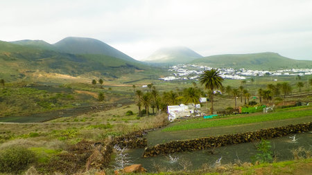 City of Haria and it's surrounding nature. Haria is city in north of Lanzarote island and is named as "City of thousand palms". Nature and travel concept.の写真素材