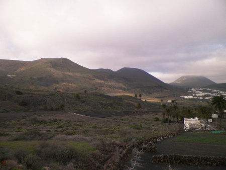 City of Haria and it's surrounding nature. Haria is city in north of Lanzarote island and is named as "City of thousand palms". Nature and travel concept.の写真素材