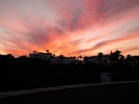 Beautiful sunset over Playa Blanca streets, Lanzarote, Canarian islands.の写真素材