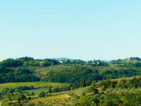 Hills, fields and meadows - typical views of Tuscany, Italy. Travel, nature and agriculture concept....