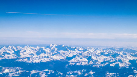 The Alps seen from an airplane window. Natural phenomenon.