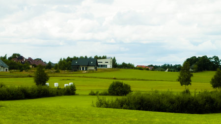 Sheaves of hay in the field. Agriculture in Kashubia Northern Poland.の写真素材