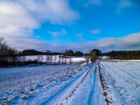 Offroad over Kashubian country area in winter. Nature and weather season concept. Polish nature.の写真素材
