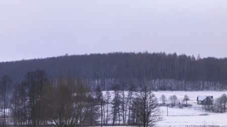 Winter over Kashubian hills, Wiezyca, Poland. Evening time and beautiful nature of Kashubian region in northern Poland.の写真素材