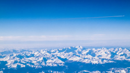 The Alps seen from an airplane window. Natural phenomenon.