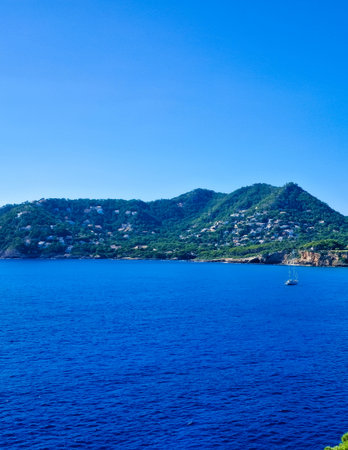 Yacht on the coast of Mallorca. Cruise over the Balearic Archipelago.