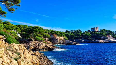The rocky shores of Mallorca near Cala Ratjada. Hot summer on an island paradise.の写真素材