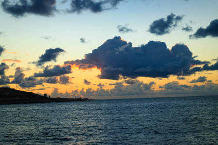 Beautiful sunrise or sunset sky over sea.の写真素材