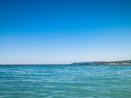 Coast and transparent, turquoise water of Tyrrhenian Sea. Travel and nature concept. Sunny Summer day. Copy space.の写真素材