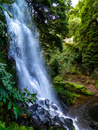Amazing waterfall on Azores. Sao Miguel Island. Beauty of nature.の写真素材