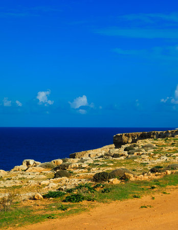 Mediterranean sea view from the cliffs on the Marfa peninsula. Malta Island.の写真素材