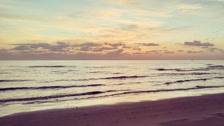 Amazing view of sunrise over sea from beach in Larnaca on Cyprus.の写真素材