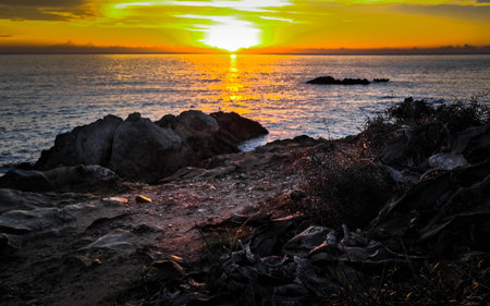 Beautiful sunrise over the coast of MajorcaBeautiful sunrise over the coast of Majorca. Amazing nature of Balearic Islands.の写真素材