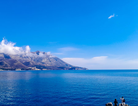 Tourists enjoying view of coast near Zvala. Spring in Montenegro. Travel concept.の写真素材