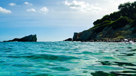 Balearic sea and coastal rocks of Mollorca. Blue crystal water amazing seascape of Balearic sea.