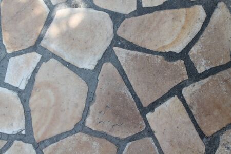Gray stone wall background. Rock floor, texture