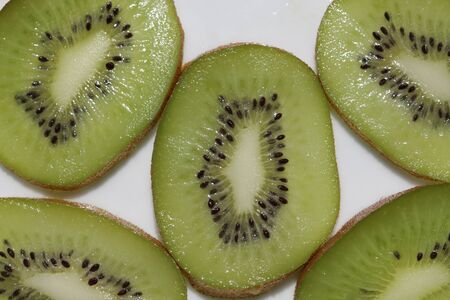 Kiwi cut by segments. Macroの写真素材