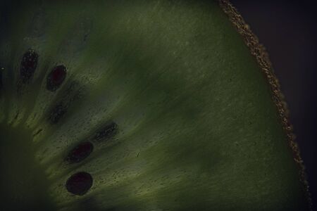 Kiwi cut by segments. Macroの写真素材