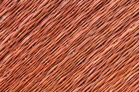 Traditional thai style nature background of brown handicraft weave texture wicker surface for furniture materialの写真素材