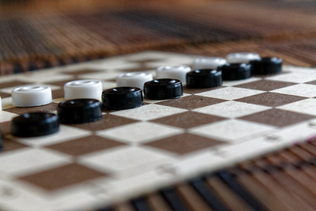Checkers in checkerboard ready for playing. Game concept. Board game. Hobby. checkers on the playing field for a game.の写真素材