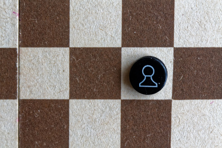 Wooden Chess Board and steel chess pieces, isolated on boardの写真素材