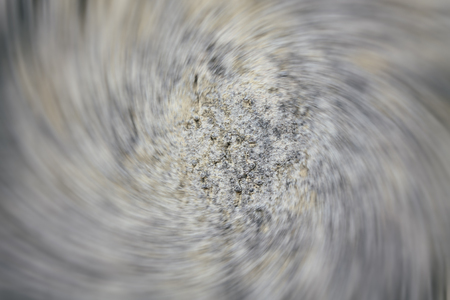 Granite rock closeup background, stone texture, cracked surface