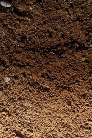 Texture of plaster on the wall, cracked background, stone surfaceの写真素材