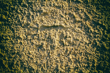Texture of plaster on the wall, cracked background, stone surfaceの写真素材