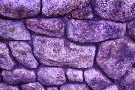 Violet Stone wall for background or rocks rough textureの写真素材