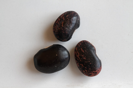 Dried kidney brown speckled beans The concept of proper nutrition and healthy lifestyle. Top view, close-up as background or textureの写真素材