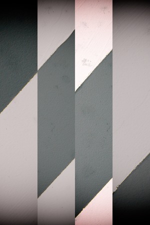 Wall with gray - white lines, detail of decoration in the city, textured background.の写真素材